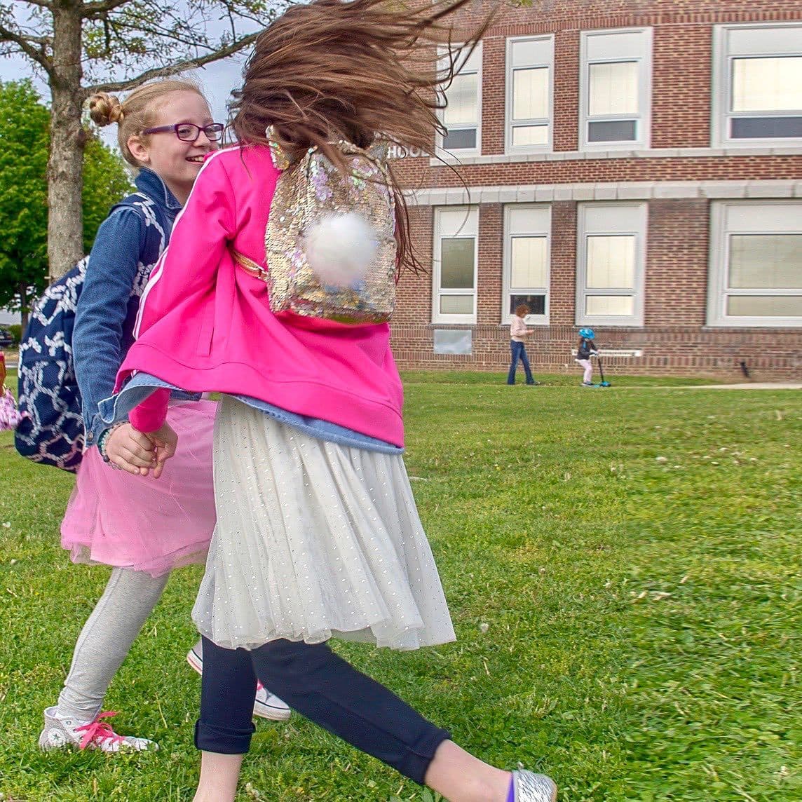 For this special memory of two friends reuniting in the schoolyard I enhanced and adjusted the hue/saturation on their p