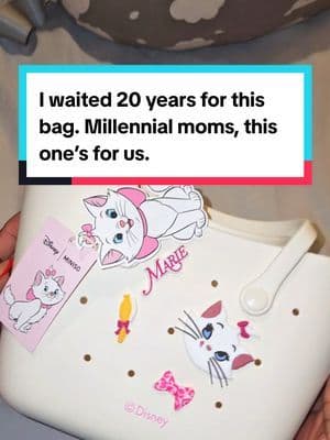 Didn’t get it as a kid. Got it for me and my daughter. It’s not just a Disney bag—it’s a generational reset. … #DisneyMomEra #MarieDisneyBag #MillennialMom #HealingWithAdultMoney #NostalgiaTok #TikTokMadeMeBuyIt #Y2KFinds #TikTokShopMothersDay #TikTokShopRestock #tiktokshopcreatorpicks #fyp #viral #creatorsearchinsights @Disney @MINISO.US merchandise